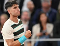 Alcaraz overcomes blip to progress to round three