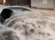 Freak storm triggers severe flooding in Italian holiday hotspot as roads turn into raging rivers